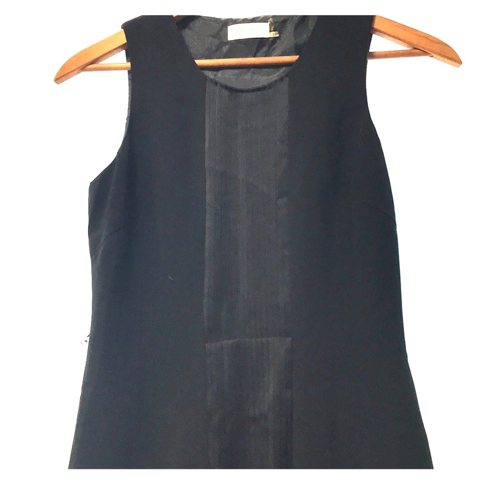 A slick, silk dress missing the belt